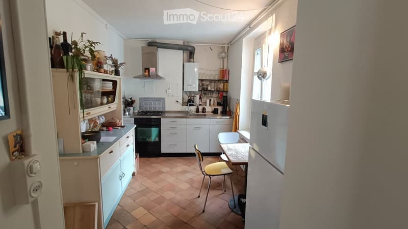 {"type": "Kitchen", "objects": ["refrigerator", "oven", "sink", "cabinets", "table", "chair", "cupboard", "faucet", "oven hood", "cupboard", "cupboard", "cupboard", "cupboard", "cupboard", "cupboard", "cupboard", "cupboard", "cupboard", "cupboard", "cupbo
