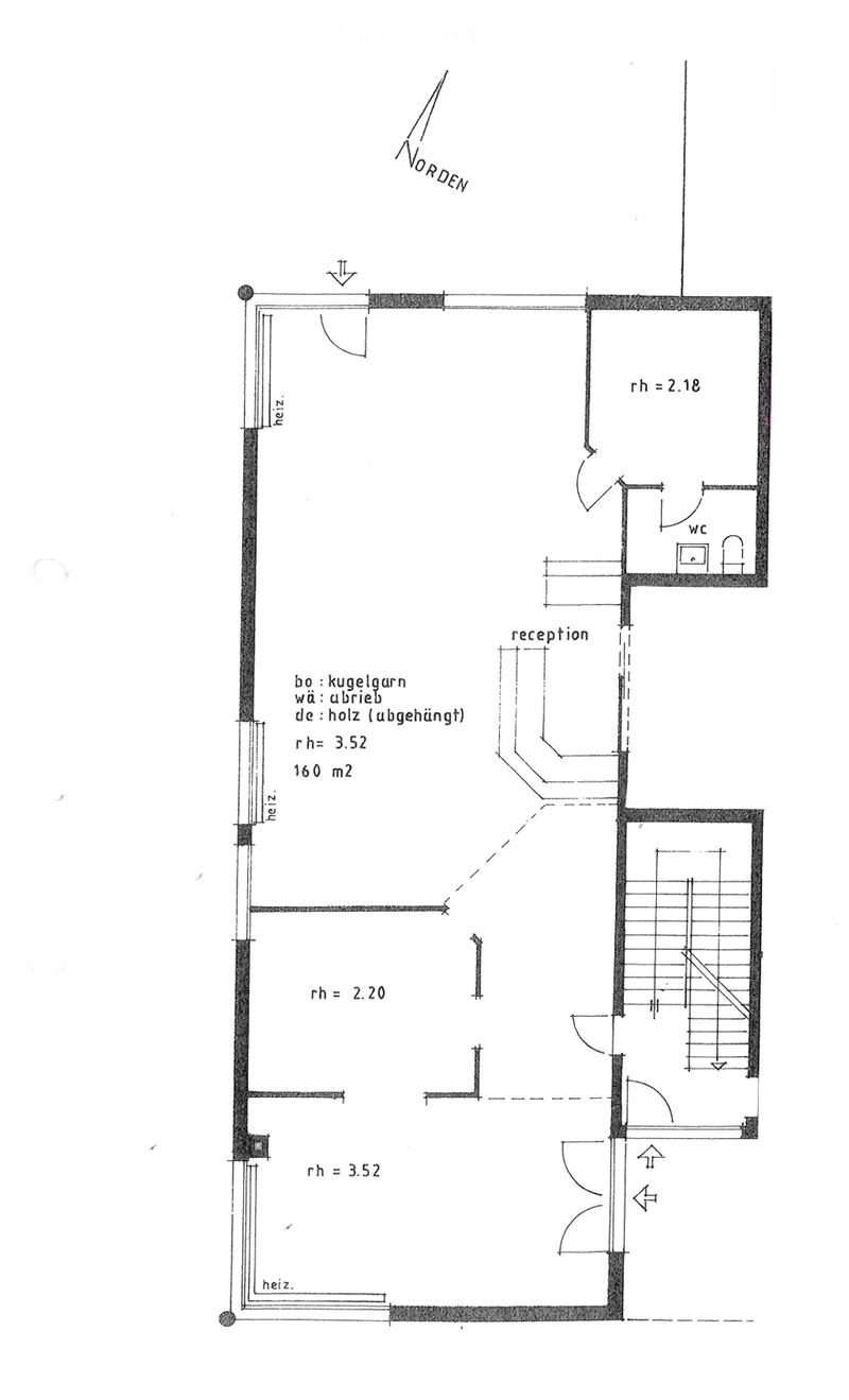 Floor plan of a building with labeled rooms including reception, WC, and staircase. Dimensions and room heights are indicated.