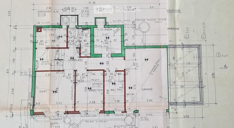 Floor plan showing a multi-room layout including a living room, dining room, kitchen, bedrooms, and a garage.