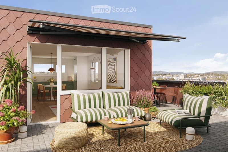 A modern rooftop terrace with a green and white striped sofa, coffee table, ottoman, and chairs. The space features a view of the city and is decorated with potted plants and a small indoor dining area visible through large glass doors.