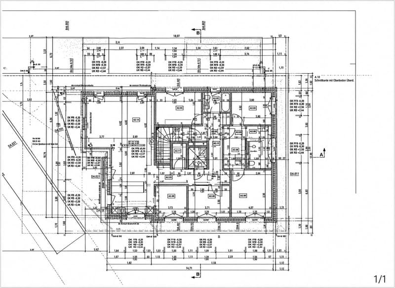 Floor plan of a multi-room building with labeled rooms, dimensions, and structural details. Includes various labeled areas such as A2.03, A2.06, A2.08, and others, with measurements and annotations.