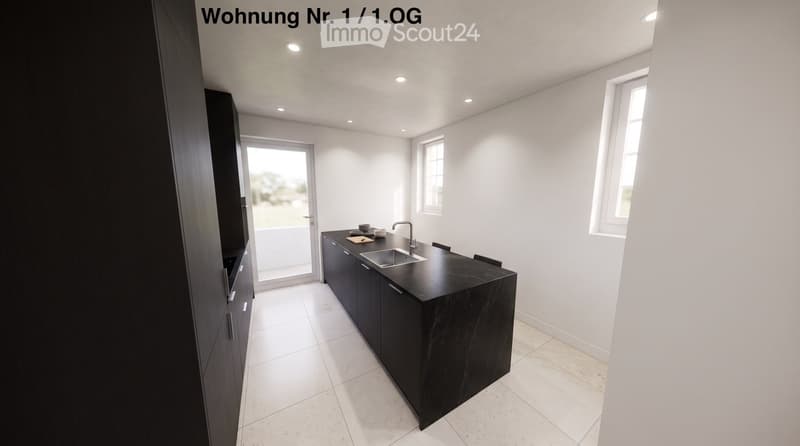 Modern kitchen with black countertops, built-in cabinets, a sink, and a small seating area with chairs.