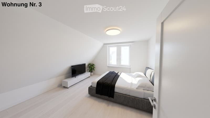Bright, modern bedroom with wooden flooring, white walls, a large window, a bed with white linens and a dark throw, a television on a white stand, and a small potted plant.