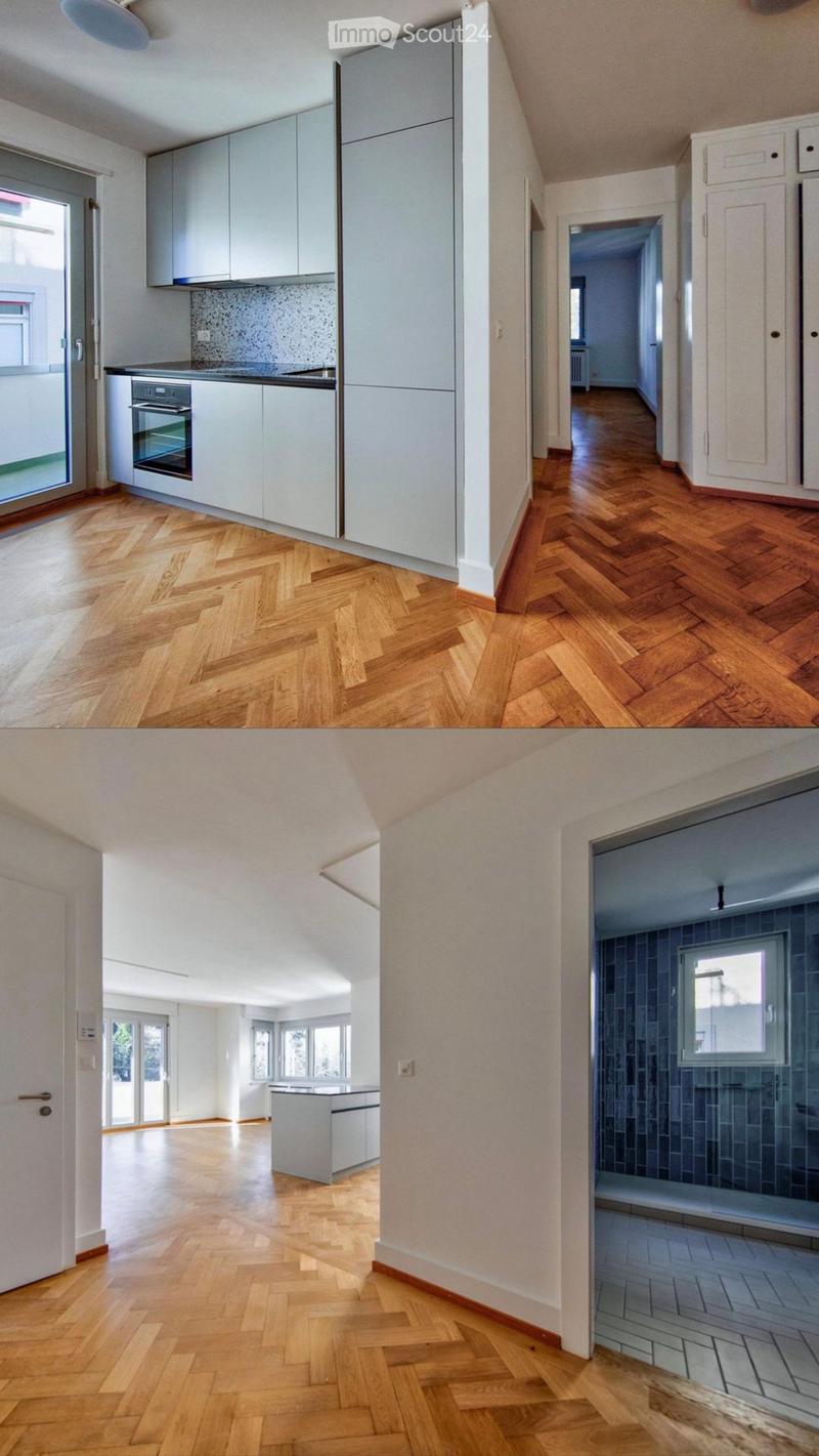 Empty rooms with herringbone wooden flooring, white cabinetry, and modern kitchen appliances. The space includes a hallway, kitchen, and bathroom area.