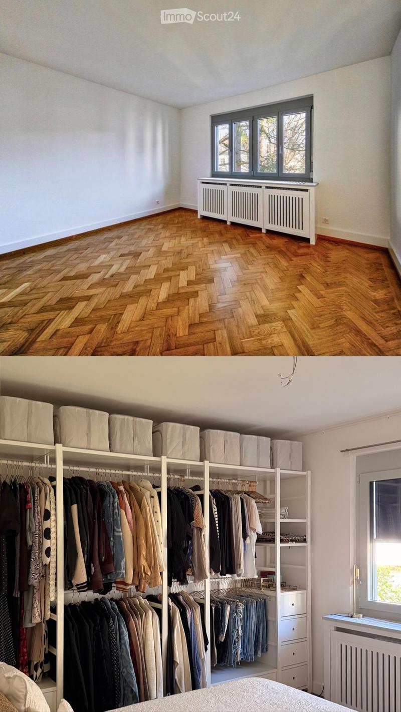 Empty room with wooden herringbone flooring, white walls, and a large window with a radiator below it.
