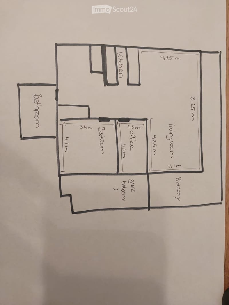 Floor plan showing a kitchen, living room, bedroom, office, bathroom, and balcony with labeled dimensions.