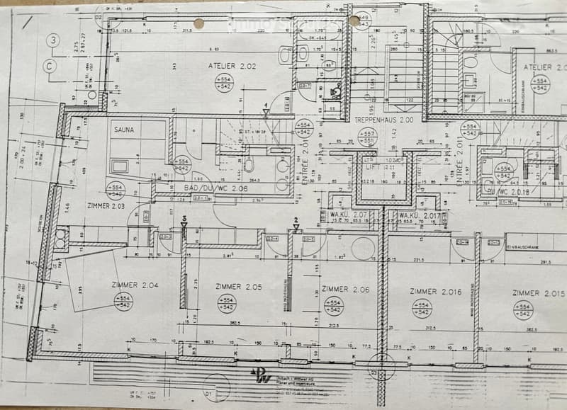 Floor plan showing multiple rooms including a sauna, bathroom/WC, and several bedrooms labeled Zimmer 2.03 to Zimmer 2.016, with an atelier and staircase area.