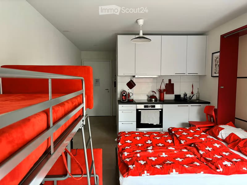 {"type": "Furnished Room", "objects": ["bed", "kitchen", "oven", "fridge", "cupboard", "chair", "table", "cupboard", "fridge", "oven", "sink", "faucet", "cupboard", "cupboard", "cupboard", "cupboard", "cupboard", "cupboard", "cupboard", "cupboard", "cupbo