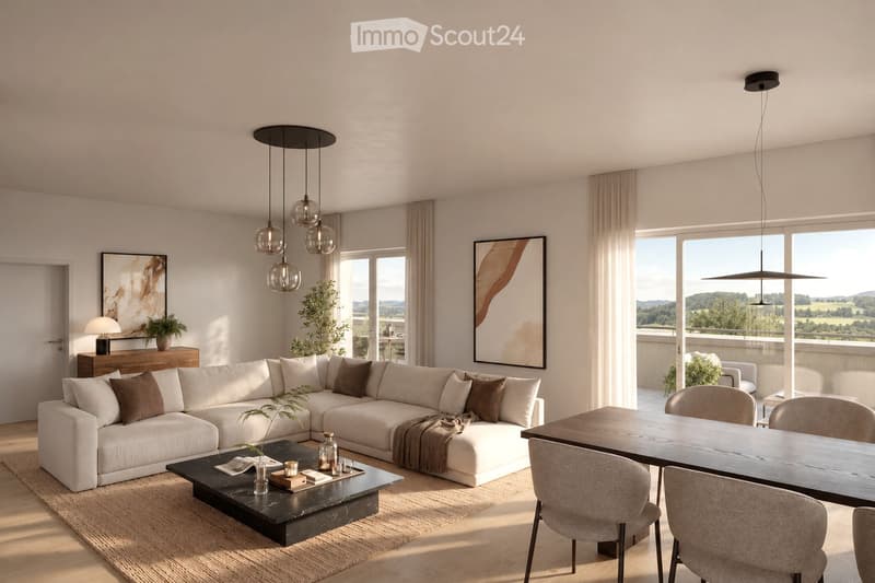Modern living room with a large sectional sofa, coffee table, dining area, pendant lights, and large windows offering a scenic view.