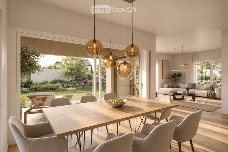 Modern open-plan living and dining area with large windows, pendant lights, a wooden dining table with chairs, a sofa, and a coffee table.
