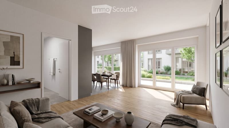 Modern living room with light wooden flooring, large windows, and a connected dining area. Features a sofa, coffee table, armchair, dining table with chairs, and decorative items.