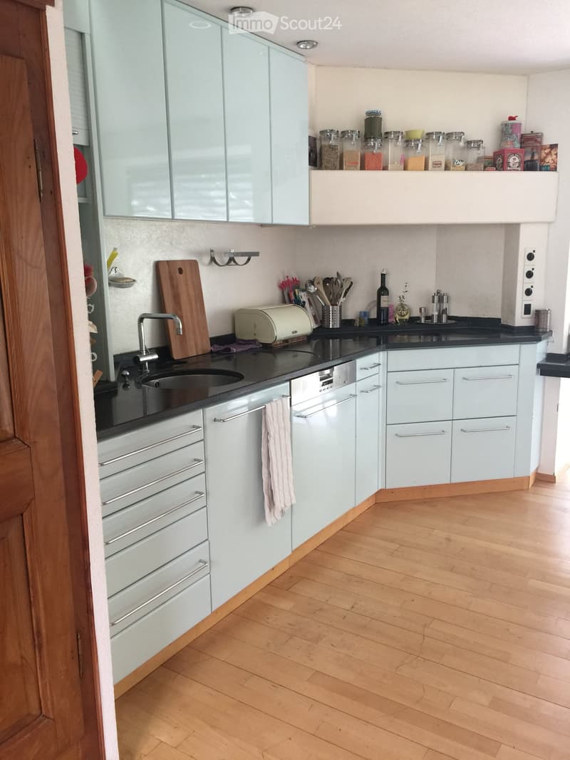 {"type": "Kitchen", "objects": ["sink", "faucet", "dishwasher", "oven", "cutting board", "toaster", "cupboard", "bottle", "towel", "cupboard", "cupboard", "cupboard", "cupboard", "cupboard", "cupboard", "cupboard", "cupboard", "cupboard", "cupboard", "cup