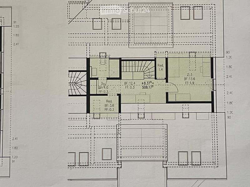 Floor plan of a multi-level building with labeled rooms and dimensions, including living areas, bedrooms, and bathrooms.