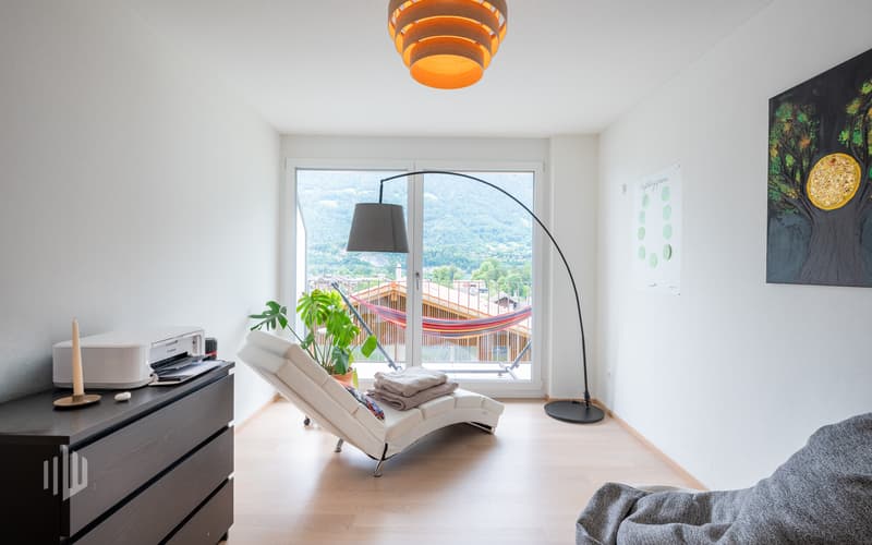 Zimmer mit Zutritt zum Balkon
