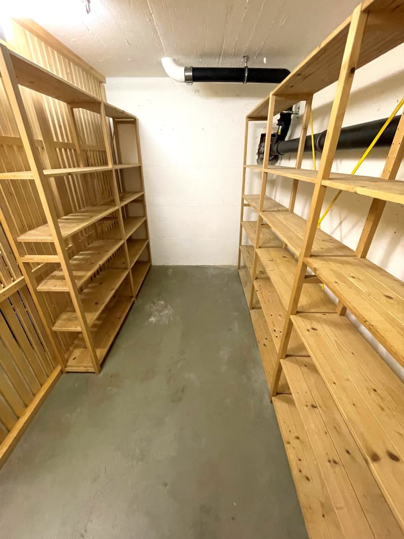 wooden shelves, metal pipes