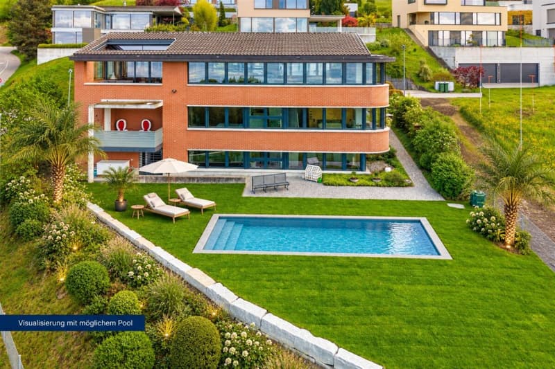 WO DER SEE ZUM PANORAMA WIRD: EXKLUSIVES EINFAMILIENHAUS AUF GROSSZÜGIGEM GRUNDSTÜCK (1)