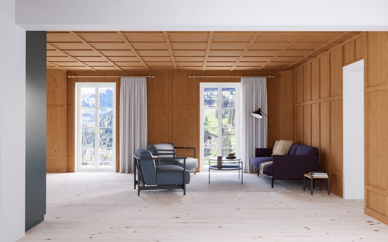 large living room with wooden walls, white floor, 2 windows with curtains, armchairs, coffee table, sofa with pillows, side table, lamps, landscape view