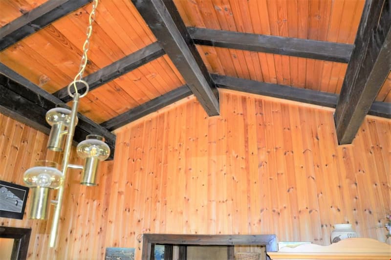 wooden walls, wooden ceiling, chandelier, wooden cabinet, picture frame