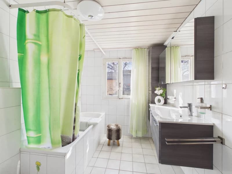 white tile, bathtub, sink, vanity, window, curtain, mirror, faucet, cabinet, stool, flowers