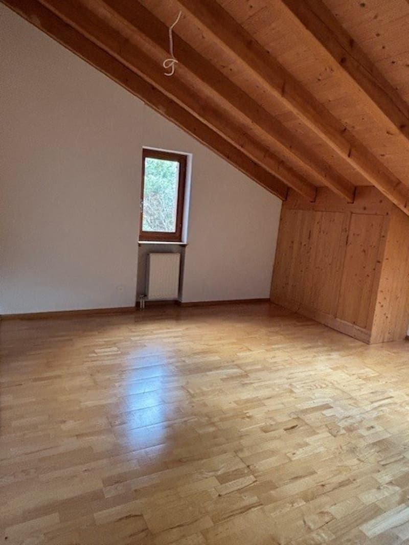 Empty room, wooden floor, wooden ceiling, wooden wall, small window