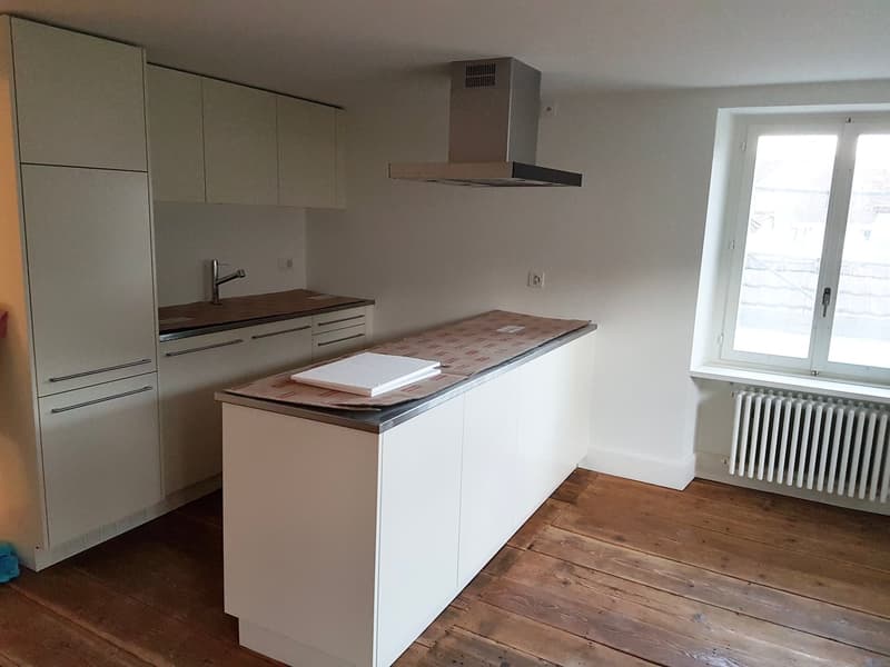 Beautiful, modern old building apartment with old, refreshed Langriehmen wooden floor in the village center (2)
