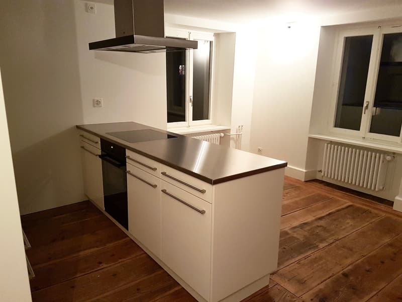 Beautiful, modern old building apartment with old, refreshed Langriehmen wooden floor in the village center (1)