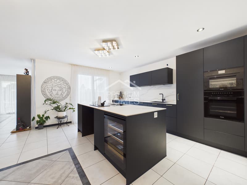 Modern garden apartment with kitchen island, wine fridge & lots of light (6)