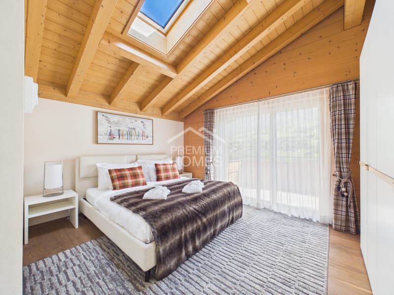 Penthouse de chalet exclusif avec panorama de montagne ! (3)