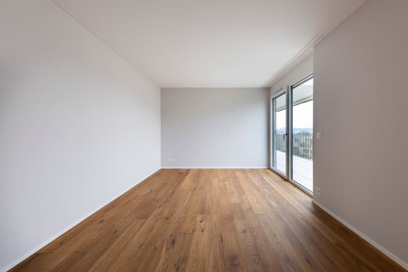 empty room, hardwood floors, white walls, balcony, sliding glass doors