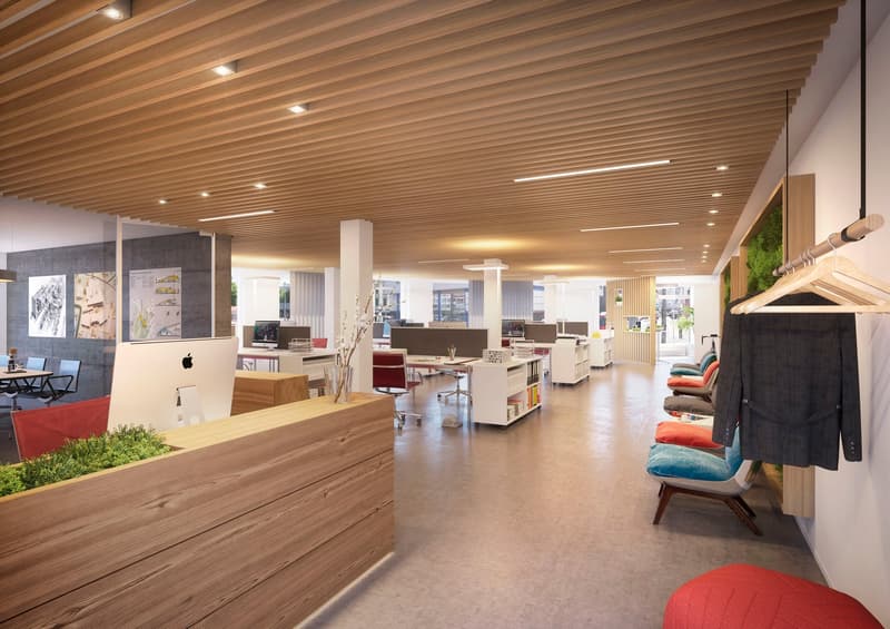 Modern office with wooden desk, glass wall, desks, monitors, plants, chairs, coat rack