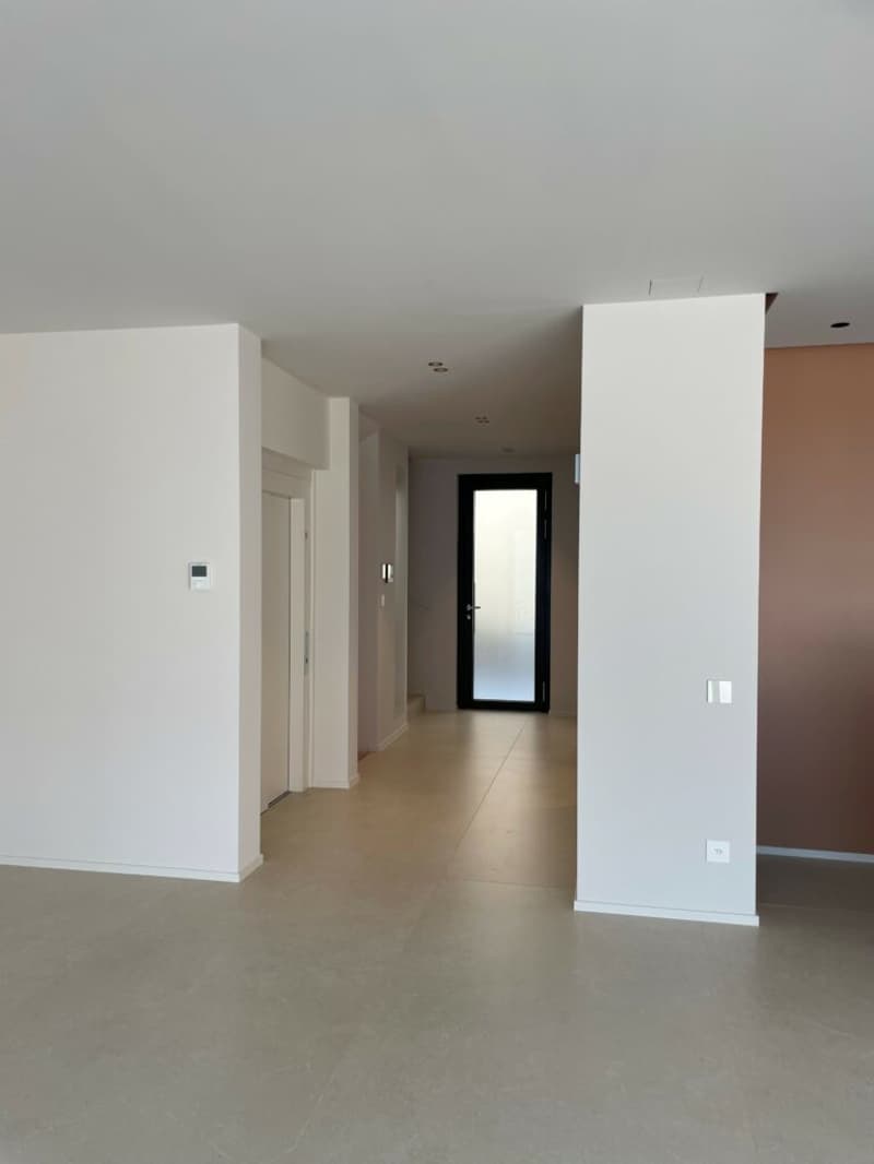 minimalist interior, white walls, tiled floor, glass door, metal railing