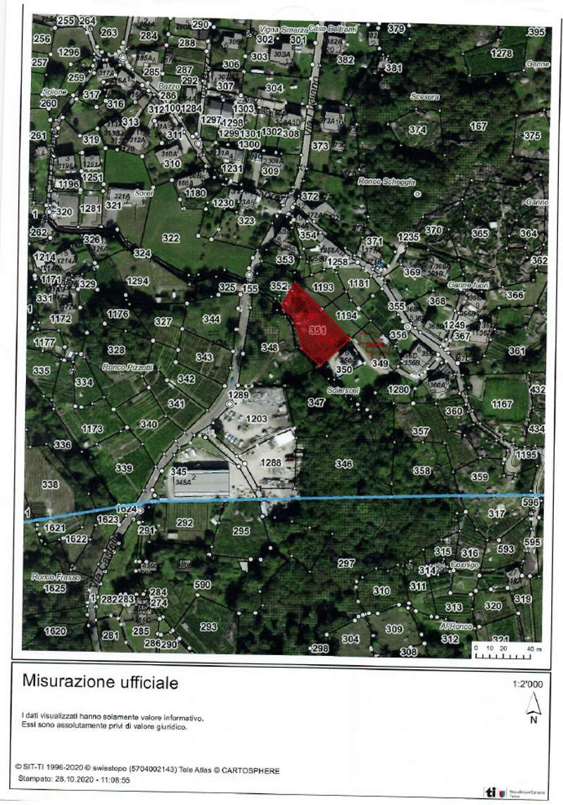 The map shows a specific plot of land located on the outskirts of a settlement. The plot has the coordinates and is surrounded by several labeled plots. The property is adjacent to roads, marked by blue lines, and has a rectangular shape. The surrounding