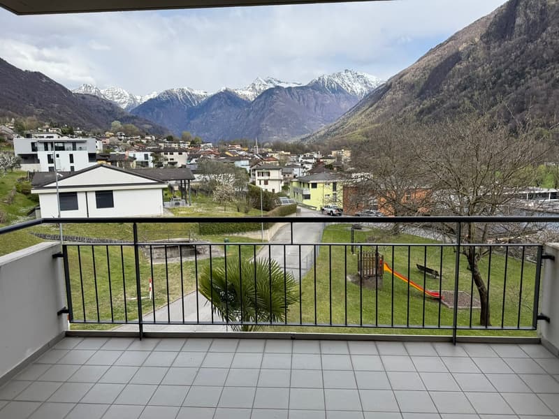 balcony, balcony railings, tiled floor, view of the city, mountains