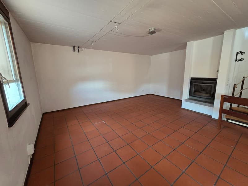 empty room, fireplace, red tiles, white walls, window