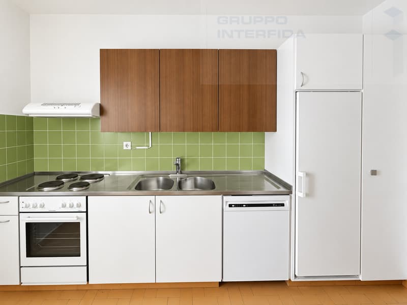 APPARTAMENTO 3.5 LOCALI IN CENTRO CON BALCONI (5)