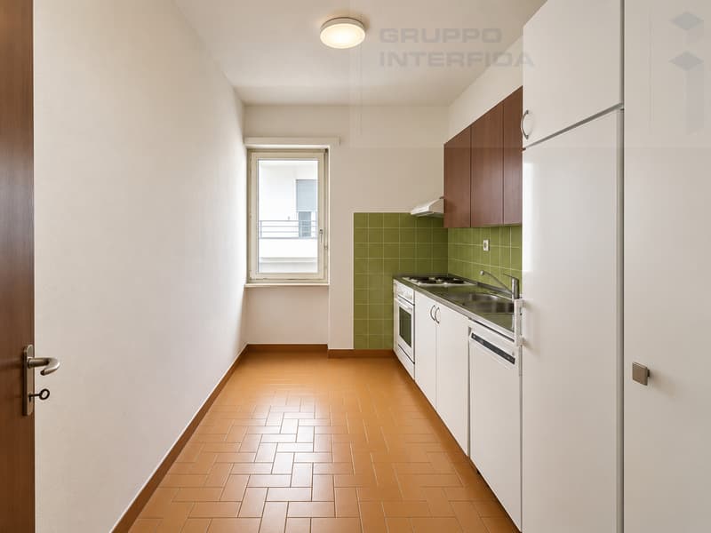 APPARTAMENTO 3.5 LOCALI IN CENTRO CON BALCONI (4)