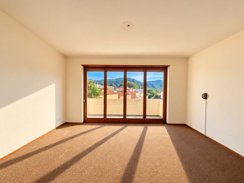 APPARTAMENTO 3.5 LOCALI CON AMPIA TERRAZZA E PARZIALE VISTA LAGO (7)