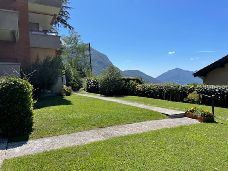 Spazioso appartamento di 2.5 locali con piscina e vista panoramica a Ruvigliana (10)