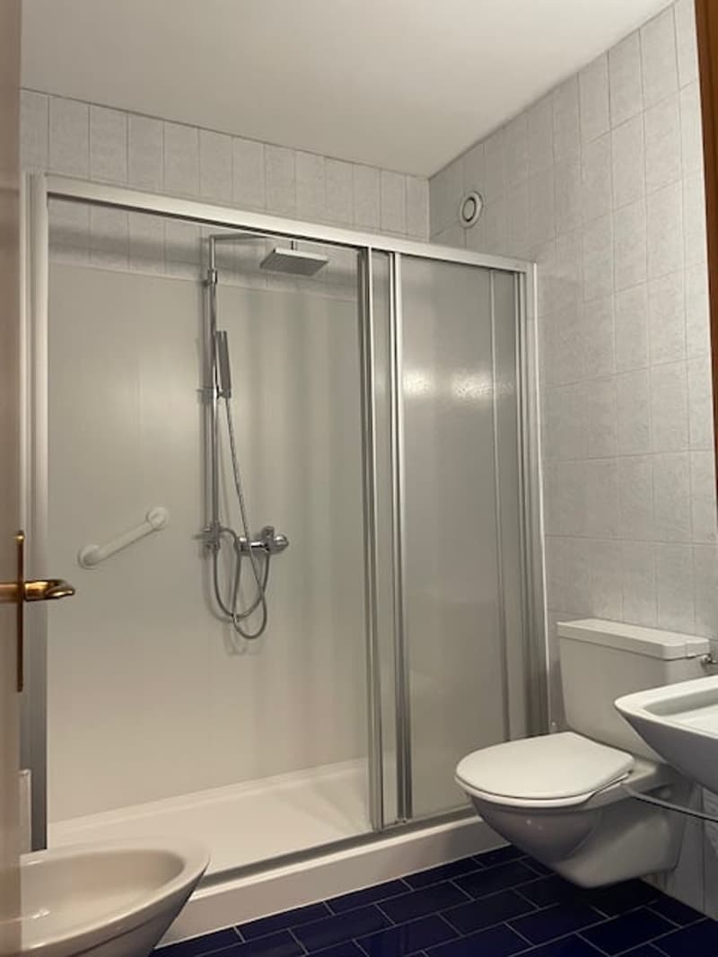 Spazioso appartamento di 2.5 locali con piscina e vista panoramica a Ruvigliana (7)