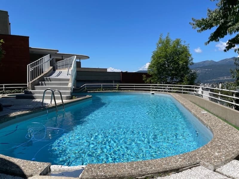 Spazioso appartamento di 2.5 locali con piscina e vista panoramica a Ruvigliana (2)