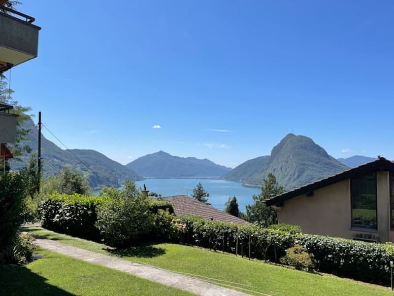 Spazioso appartamento di 2.5 locali con piscina e vista panoramica a Ruvigliana (8)