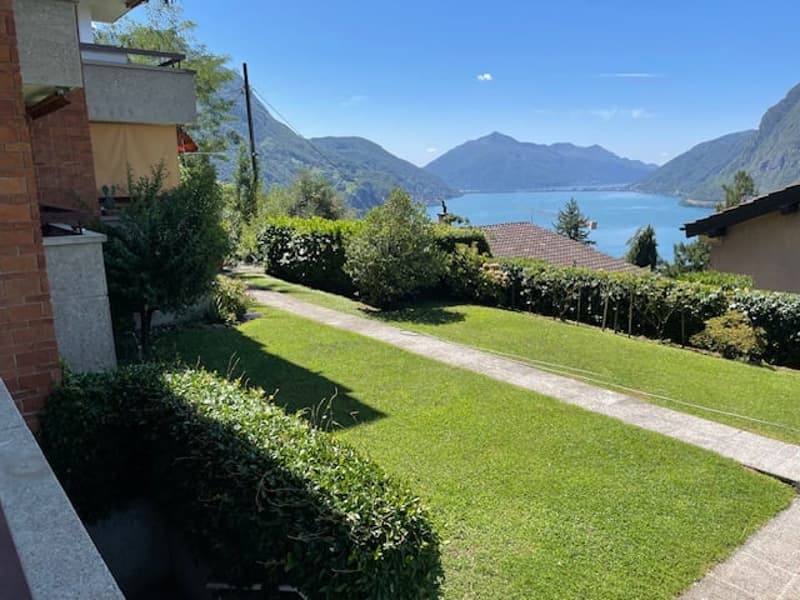 Spazioso appartamento di 2.5 locali con piscina e vista panoramica a Ruvigliana (9)