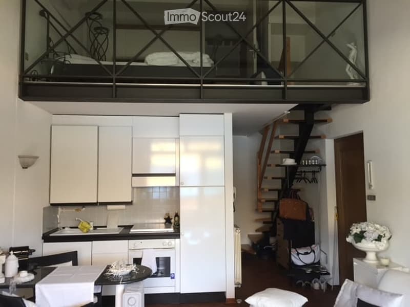 Modern apartment, white kitchen, wooden staircase, living room, dining room, balcony