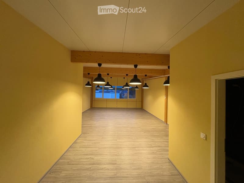 yellow walls, wooden floor, lamps, window, open door