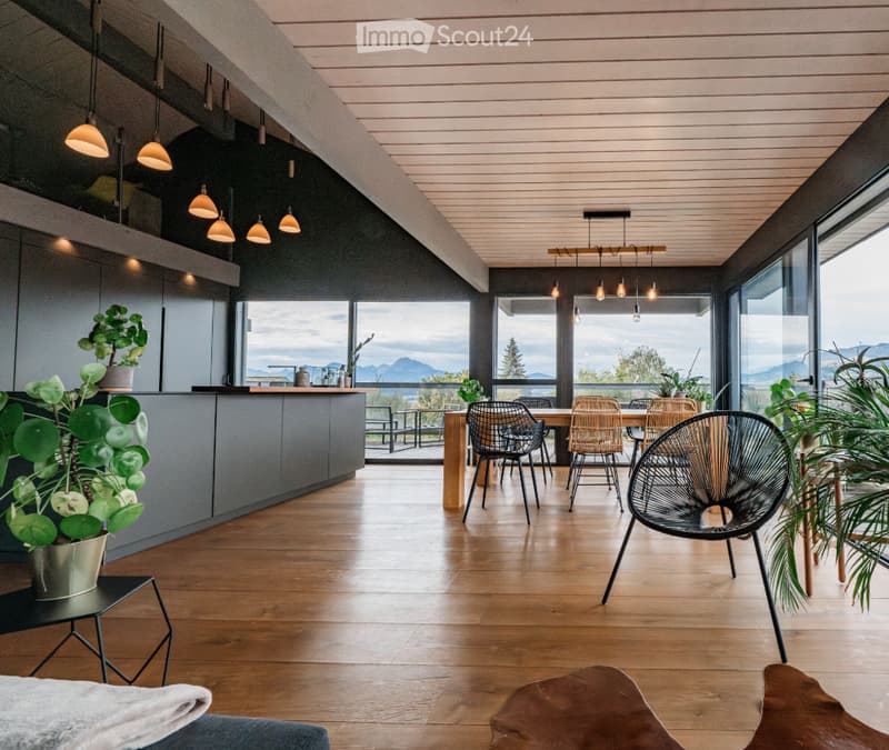 open kitchen, dining area, view to mountains, plants, wooden floor