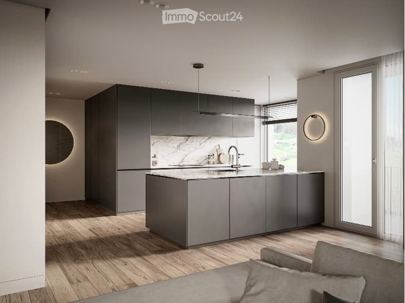 Modern, minimalist kitchen with dark gray cabinets, marble backsplash, and built-in appliances including a dishwasher. The kitchen opens up to a living room area with hardwood floors.