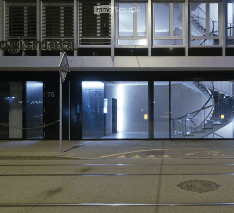 modern architecture, large windows, staircase visible, entrance to 76