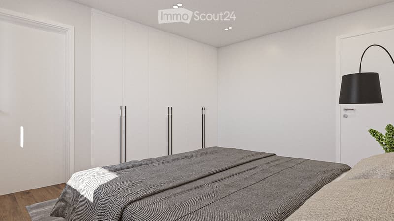 Bedroom with bed, white walls, wooden floor, built-in wardrobes, lamp