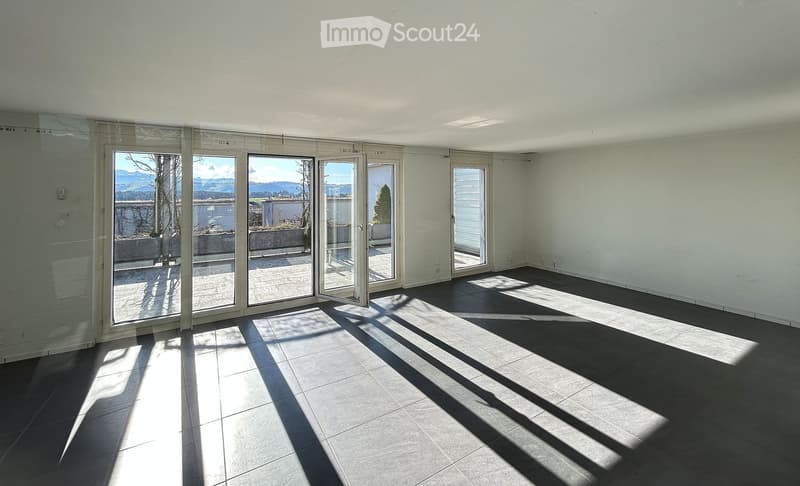 empty room, sliding glass doors to terrace, tile floor, mountain views