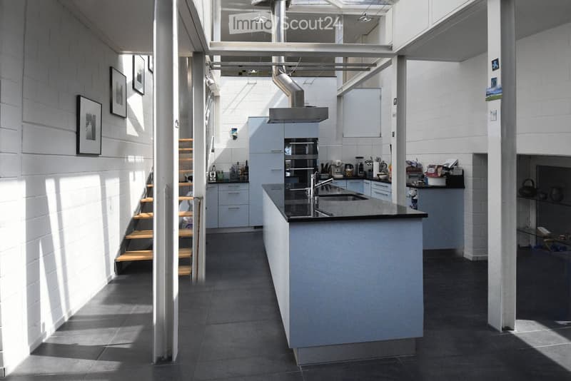 modern kitchen, central island, blue cabinets, stainless steel appliances, open shelves, metal ceiling